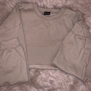 Tan/cream colored cropped sweatshirt